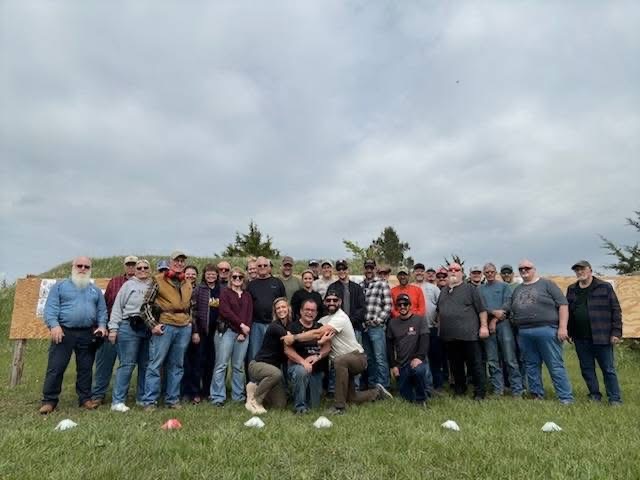 Club members gathered for a group photo after a match