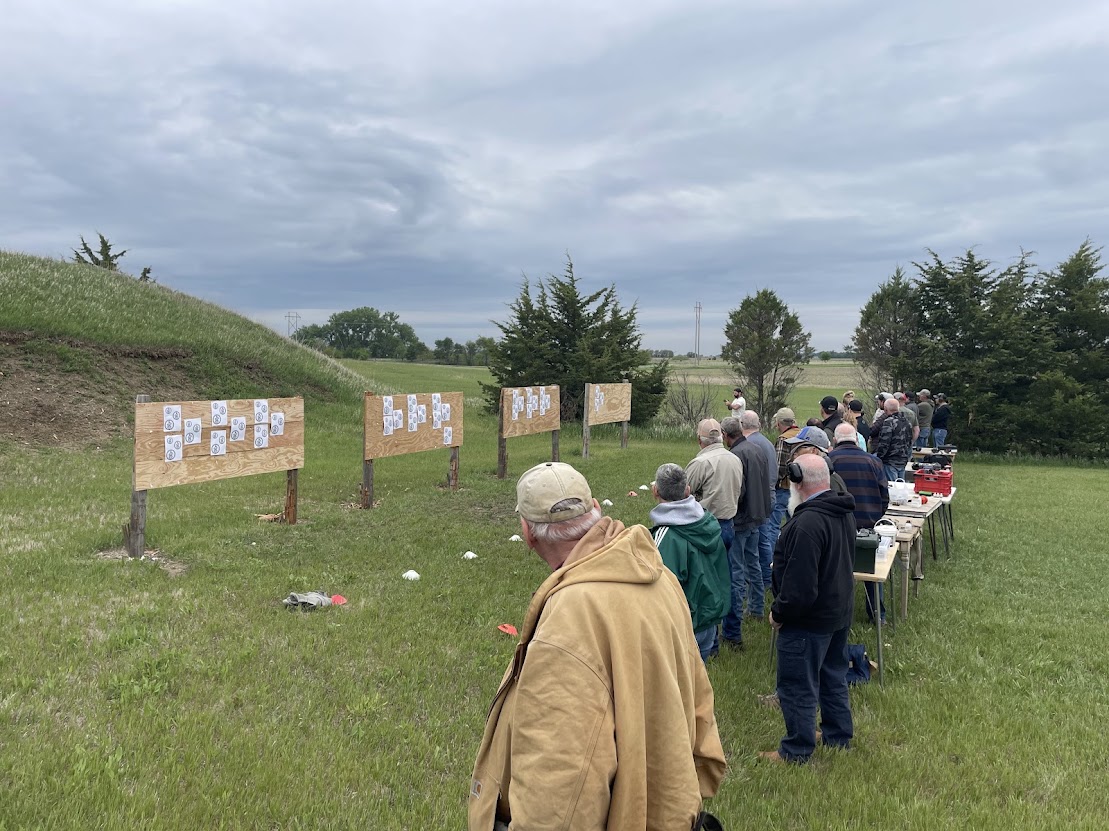 Competitors watching the line during an outdoor match